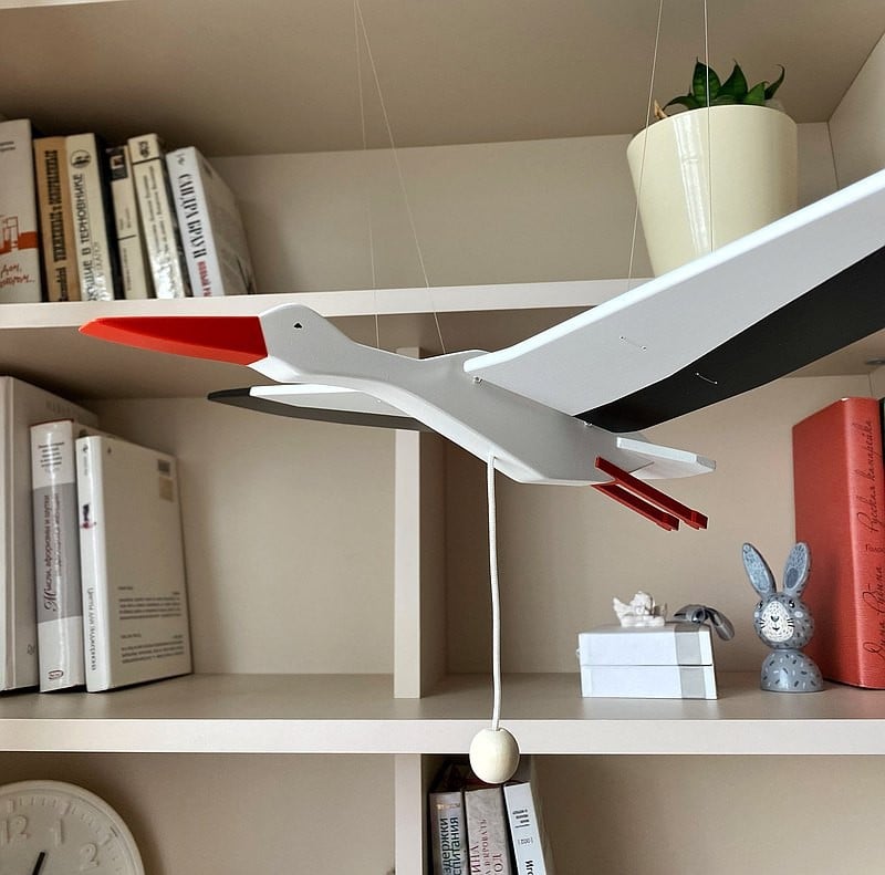 Mobile bird Flying stork